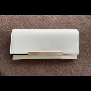 White ALDO Clutch with gold trim